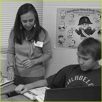 Mrs. Burton helping a student